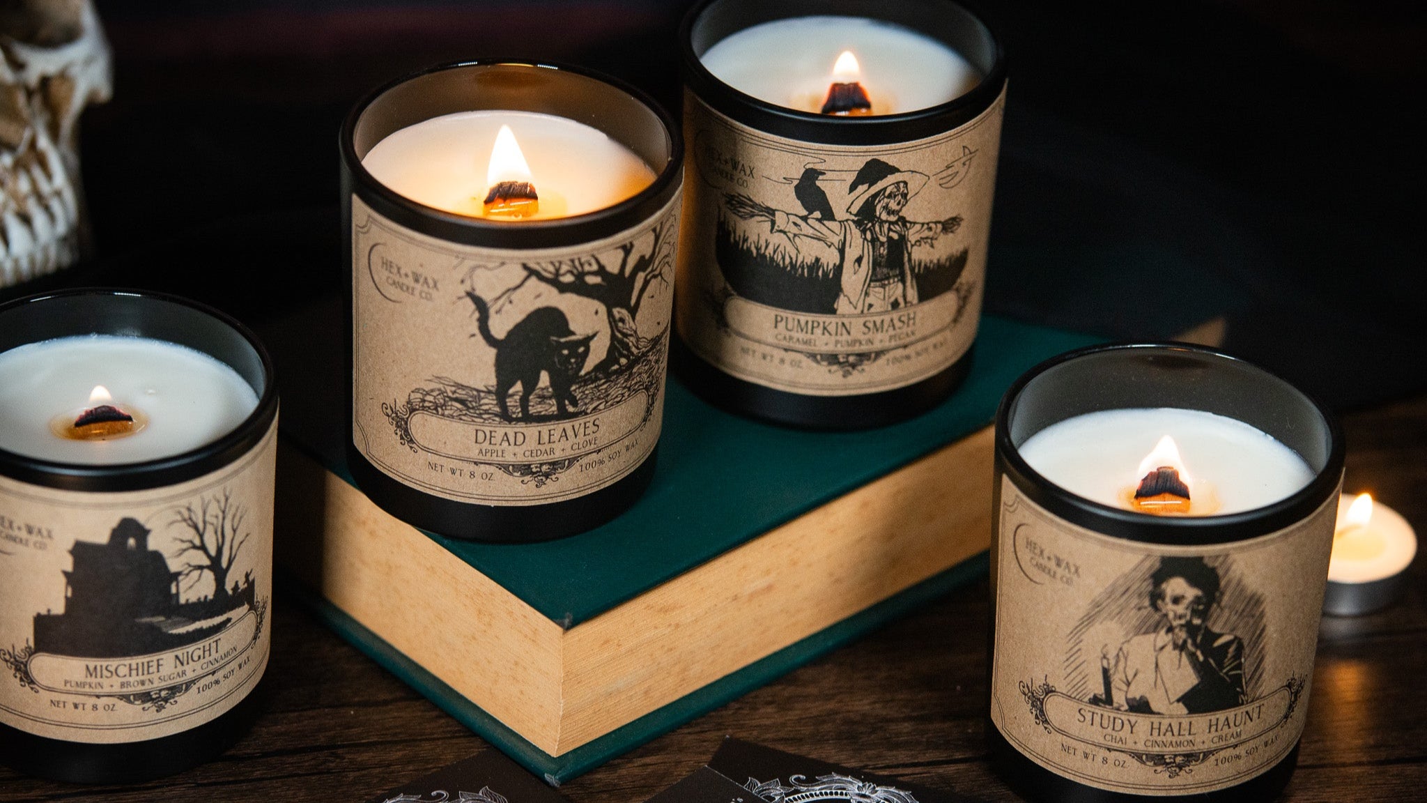 Set of gothic candles with short stories on a dark background