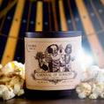 Load image into Gallery viewer, creepy clowns on a candle in a circus tent surrounded by popcorn