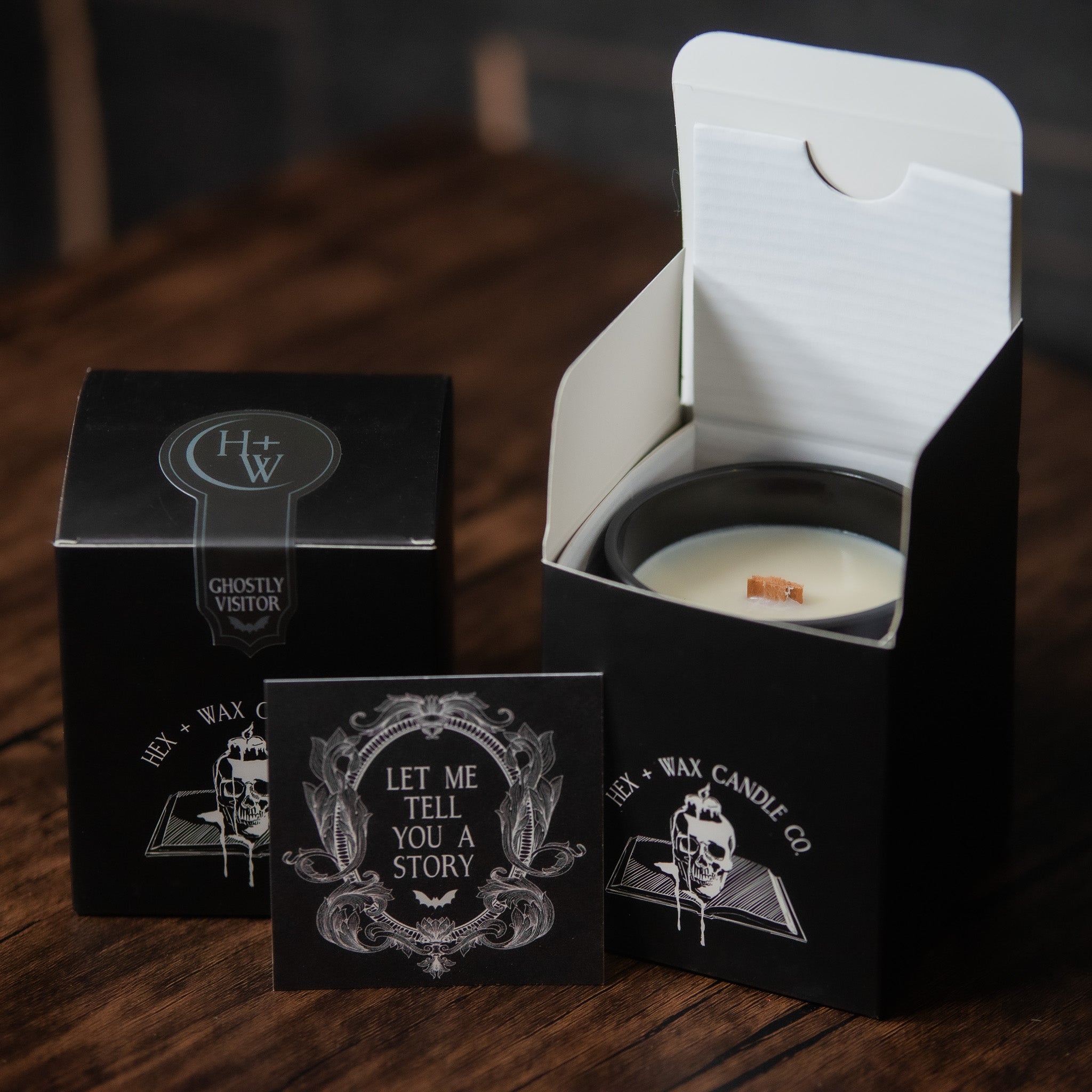 Hex and Wax Candle Co box with story card and Ghostly Visitor sticker.
