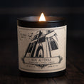 Load image into Gallery viewer, Front of Nox Aeterna candle featuring a gothic cathedral and bats.
